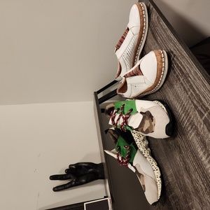 2 pairs of sneakers one is Steve madden, both size 9